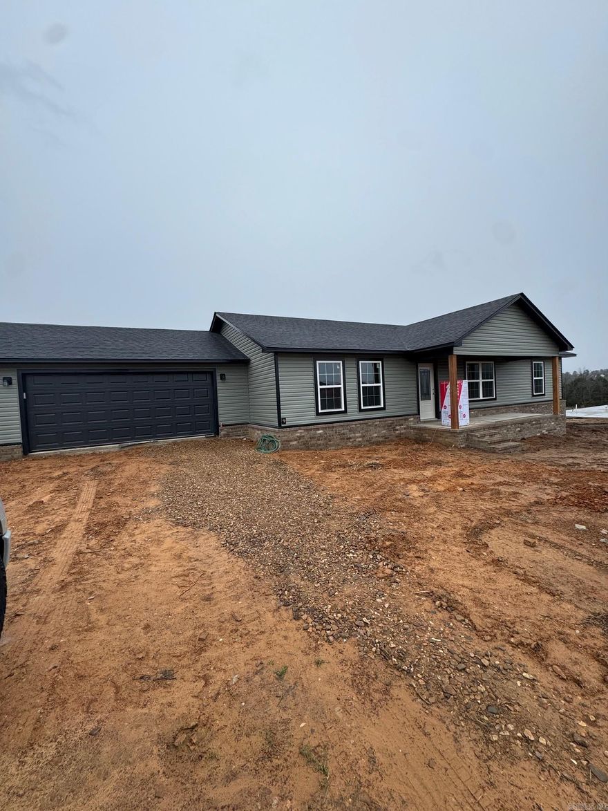 Beautiful new construction featuring 3 bedrooms, 2 baths, and a split floor plan designed for comfort and privacy. The open-concept living, kitchen, and dining area creates an easy, welcoming flow throughout the home. Located just outside the city limits, you’ll love the quiet setting while still being close to town.