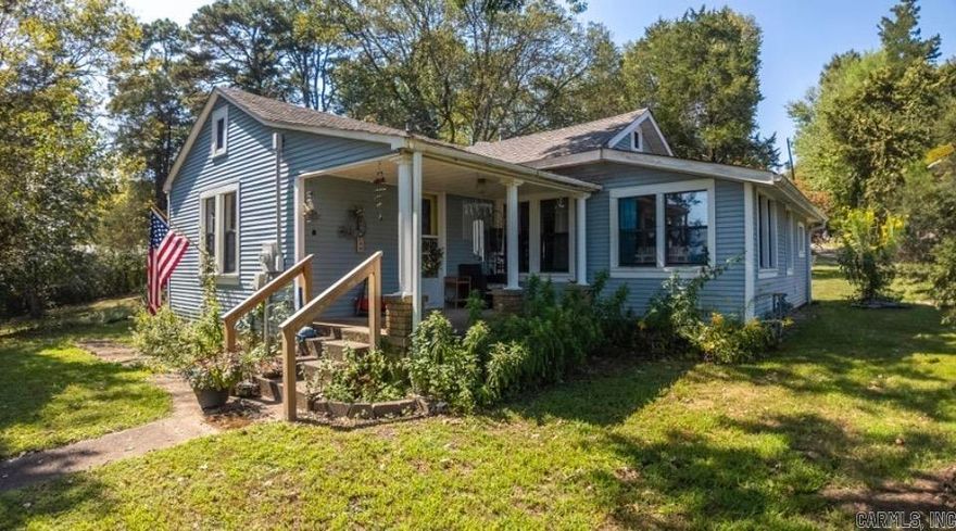 Charming Cottage with Peaceful Views + Bonus Lot! Welcome to this adorable 3-bedroom, 1.5-bath cottage perfectly positioned to take in beautiful rolling hill and pasture views right from your front porch. Step inside to find a warm and inviting layout featuring a spacious den, giving you plenty of room to relax, gather, or spread out comfortably. Out back, enjoy a large deck--ideal for entertaining guests or simply unwinding at the end of the day. And don't miss the screened-in porch, the perfect spot for enjoying summer evenings without the bugs. As an added bonus, this property includes an extra unrestricted lot, offering endless possibilities--build, expand, or keep it for added privacy. Cozy charm Scenic view  the additional lot adds 1.25 acres with separate septic & utilities to give the option of placing a mobile or other dwelling. Behind the house you'll find a detached double carport, with a space for RV behind that with it's own light pole.