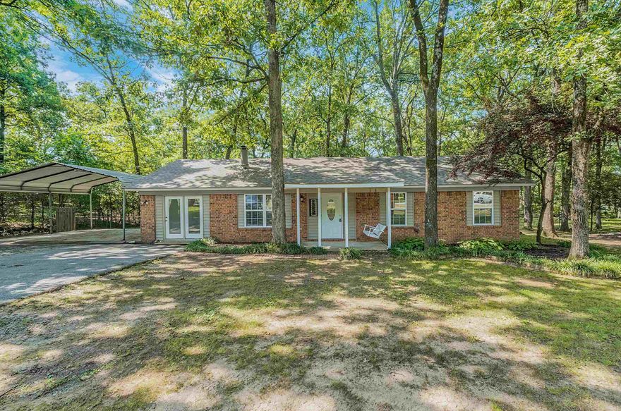 Welcome to your newly renovated dream home! This charming brick home is nestled on a spacious wooded lot, offering tranquility and privacy. Boasting 3 bedrooms and 2 bathrooms, it features a bonus room that can easily be converted into a 4th bedroom or utilized as an office or playroom.  Step inside to discover a fresh, modern interior with new paint, flooring and trim throughout, complemented by stylish countertops that enhance the kitchen and bathrooms. The heart of the home is warmed by a woodburning fireplace, equipped with a gas line for convenience and efficiency.  Other notable updates include a new HVAC system, ensuring year-round comfort and energy savings, new roof 2022, new range ordered and to be installed soon, new flooring, paint and fixtures. Whether you're enjoying the peaceful surroundings outdoors or the cozy ambiance indoors, this home is designed to provide comfort, functionality, and enduring charm. Don't miss your chance to make this meticulously renovated property yours! Call 501-231-7718