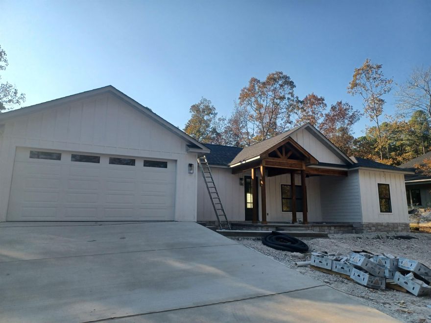 October completion...This cute as a button, Magnolia design, has everything you are looking for! 3/2 with an oversized 2 car garage. Custom cabinets in kitchen, laundry and both baths. Luxury vinyl floors, custom tile showers, designer colors and fixtures and more.  Enjoy your peaceful and relaxing wooded view from your private covered back porch. Call for floorplans.