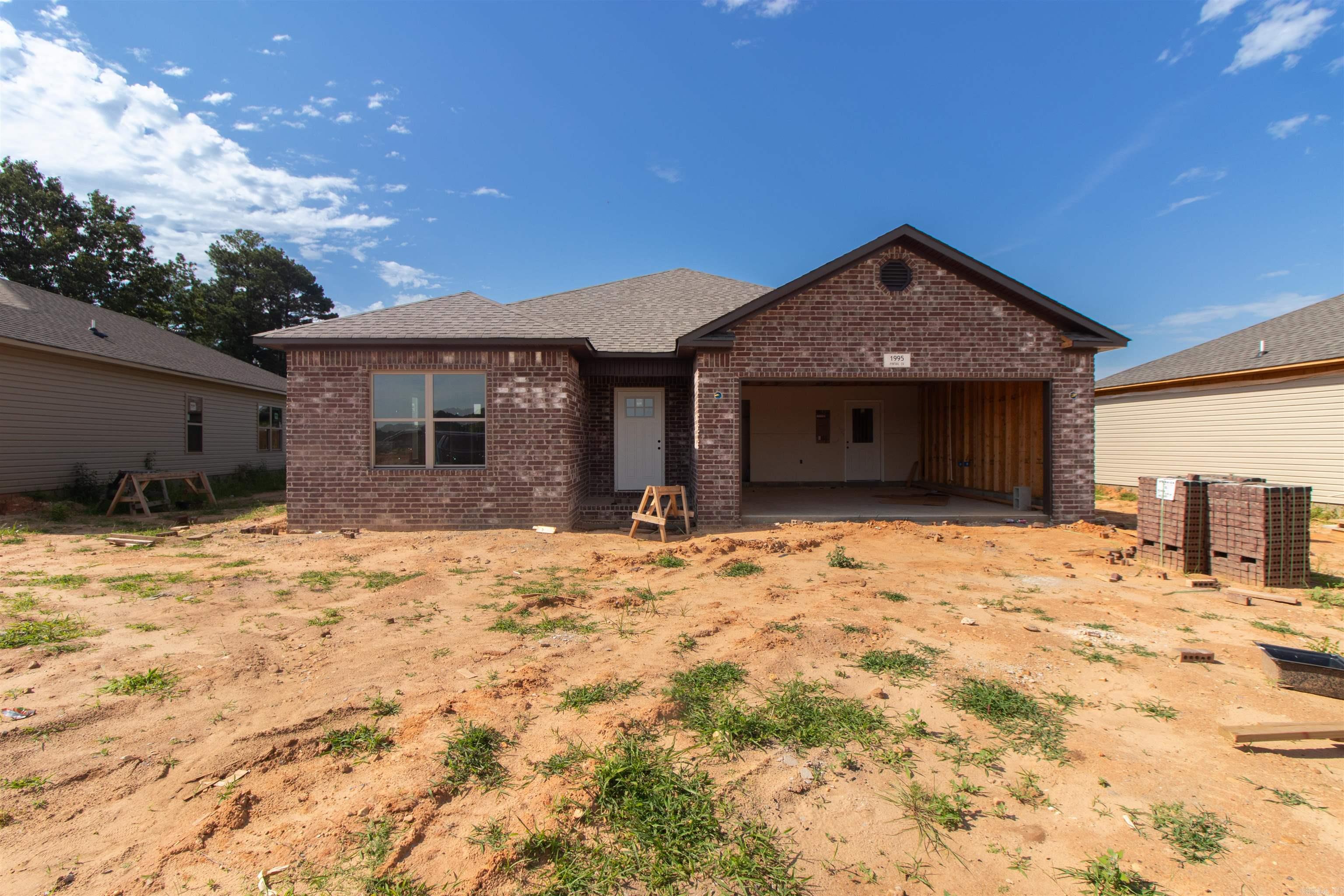 Discover your dream home in Lakewood Landing Subdivision, Lake City, AR! This stunning 1,280 sq ft residence features beautiful caramel oak cabinets, satin nickel hardware, and dramatic warm marble-look countertops. Located in the prestigious Riverside School District, offering the unique opportunity to graduate high school with an associate degree. Enjoy the convenience of being close to all Lake City amenities, including shops, dining, and outdoor activities. Don't miss out on this perfect blend of style and convenience. Contact your favorite realtor to schedule a showing today!