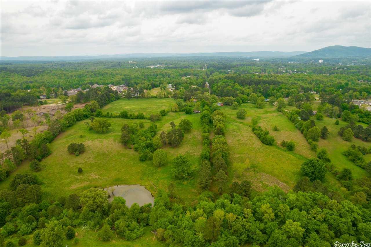Attention developers, builders, investors or anyone looking to build their dream estate. This prime acreage borders four different subdivisions and offers endless possibilities. 44 acres of blank canvas to build your vision. Rolling pastures with lake and mountain views.