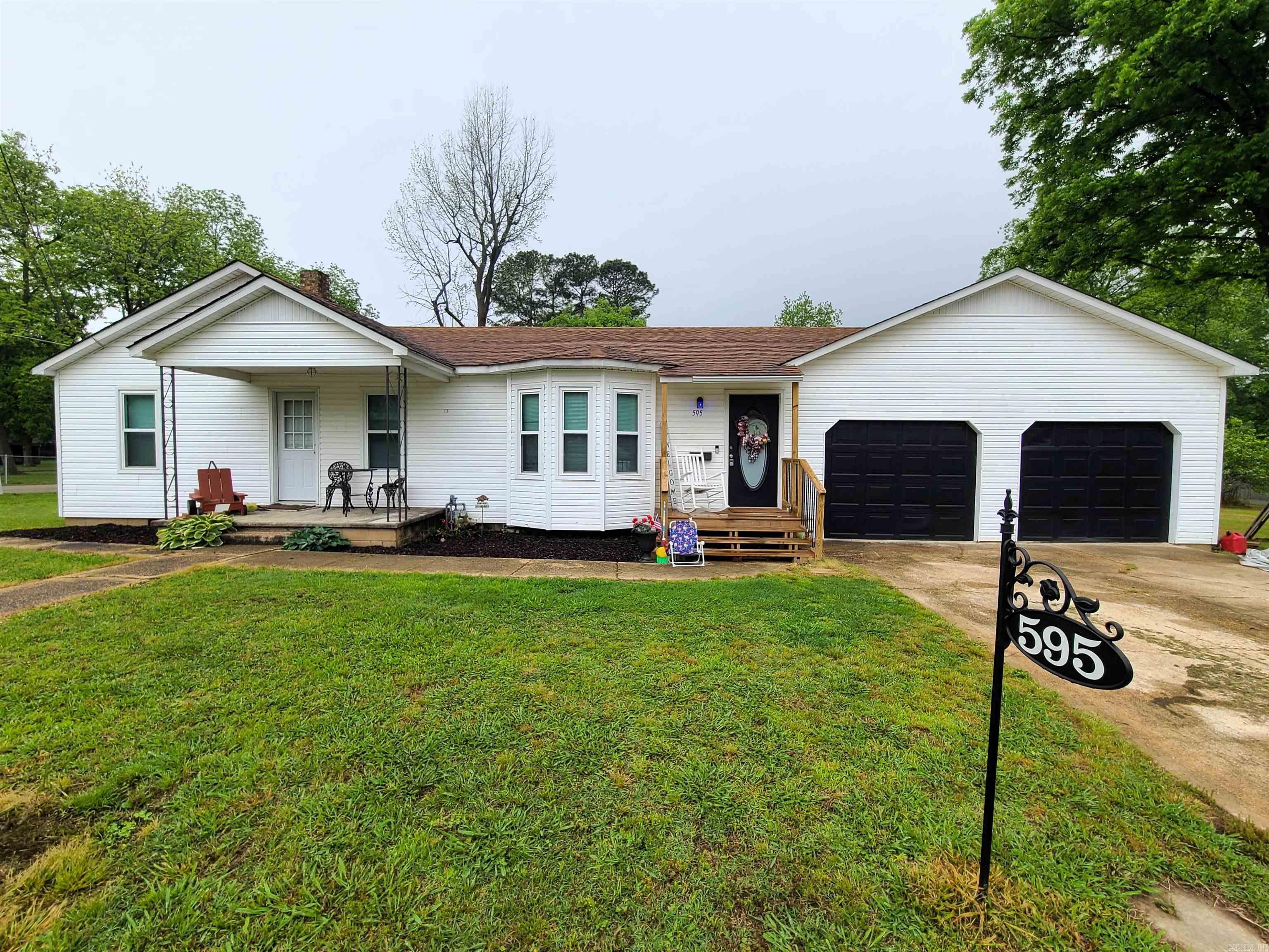 595 S. Houston Ave., Piggott, AR is a move in ready 3 bed 2 bath home with 1,427 sq ft sitting on a 0.23-acre lot. This property is conveniently located near the town square, for any local shopping. This property features a spacious primary bathroom with access to the laundry room. The laundry room comes equipped with a door that leads you to the backyard. This home also features a large two car garage. Call to schedule a showing of this amazing property today!