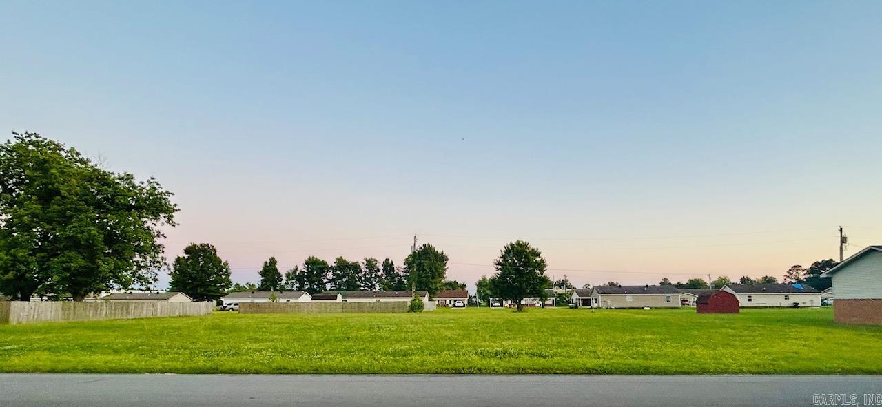 2 spacious level lots (.60 acres) in quiet established neighborhood. All city utilities are accessible. Perfect spot for building.