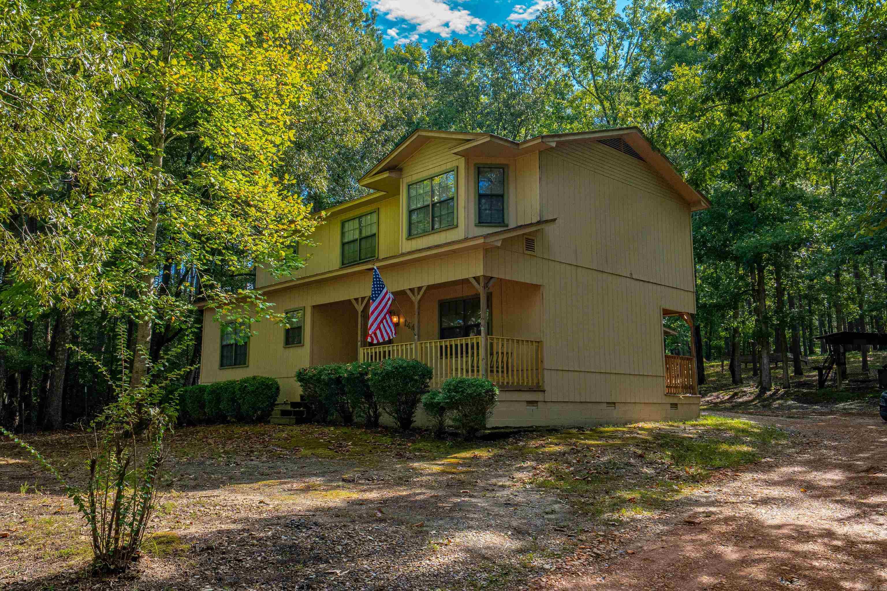 Experience the ideal mix of country charm and convenience at this 3-bedroom, 2-bath home nestled on 1.5+/- acres of land shaded by mature trees. Just minutes from Arkadelphia and Interstate 30, the location makes daily commutes simple while still giving you plenty of space to spread out and enjoy privacy. Inside, the home offers a comfortable floor plan with bright, welcoming living areas and a dedicated office or flex spaceāperfect for working from home, hobbies, or extra storage. With its inviting layout, acreage, and prime location, this property is ready to be the perfect place to call home.