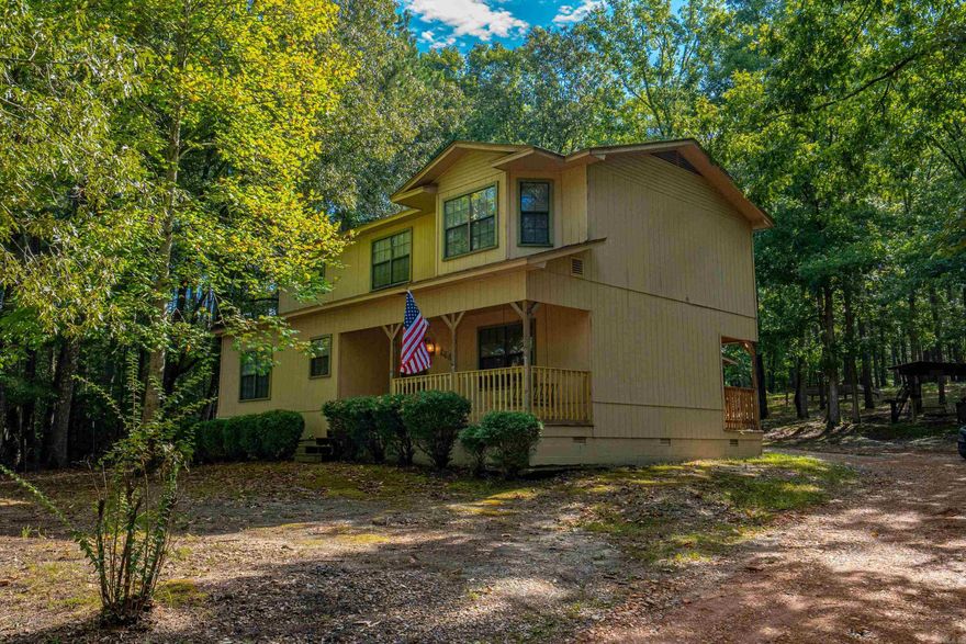 Experience the ideal mix of country charm and convenience at this 3-bedroom, 2-bath home nestled on 1.5+/- acres of land shaded by mature trees. Just minutes from Arkadelphia and Interstate 30, the location makes daily commutes simple while still giving you plenty of space to spread out and enjoy privacy. Inside, the home offers a comfortable floor plan with bright, welcoming living areas and a dedicated office or flex space—perfect for working from home, hobbies, or extra storage. With its inviting layout, acreage, and prime location, this property is ready to be the perfect place to call home.