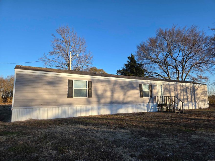 Charming 3-bedroom, 2-bath home on 1 acre in a quiet country setting. Featuring new carpet throughout and a relaxing garden tub in the master bath. This secluded property is move-in ready and offers the perfect retreat. Don’t miss out on this great opportunity!  Ask your agent about possible Seller Financing Options.