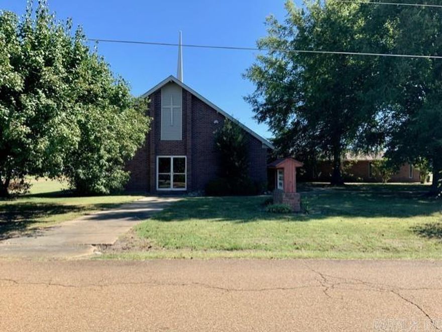 Lovely church building! Fully functioning with sanctuary, classrooms, offices and fellowship hall. Kitchen needs some TLC. Hard surfaced parking. Building is a perfect location for church, private school, daycare or office. Listing agent is a member of the congregation.