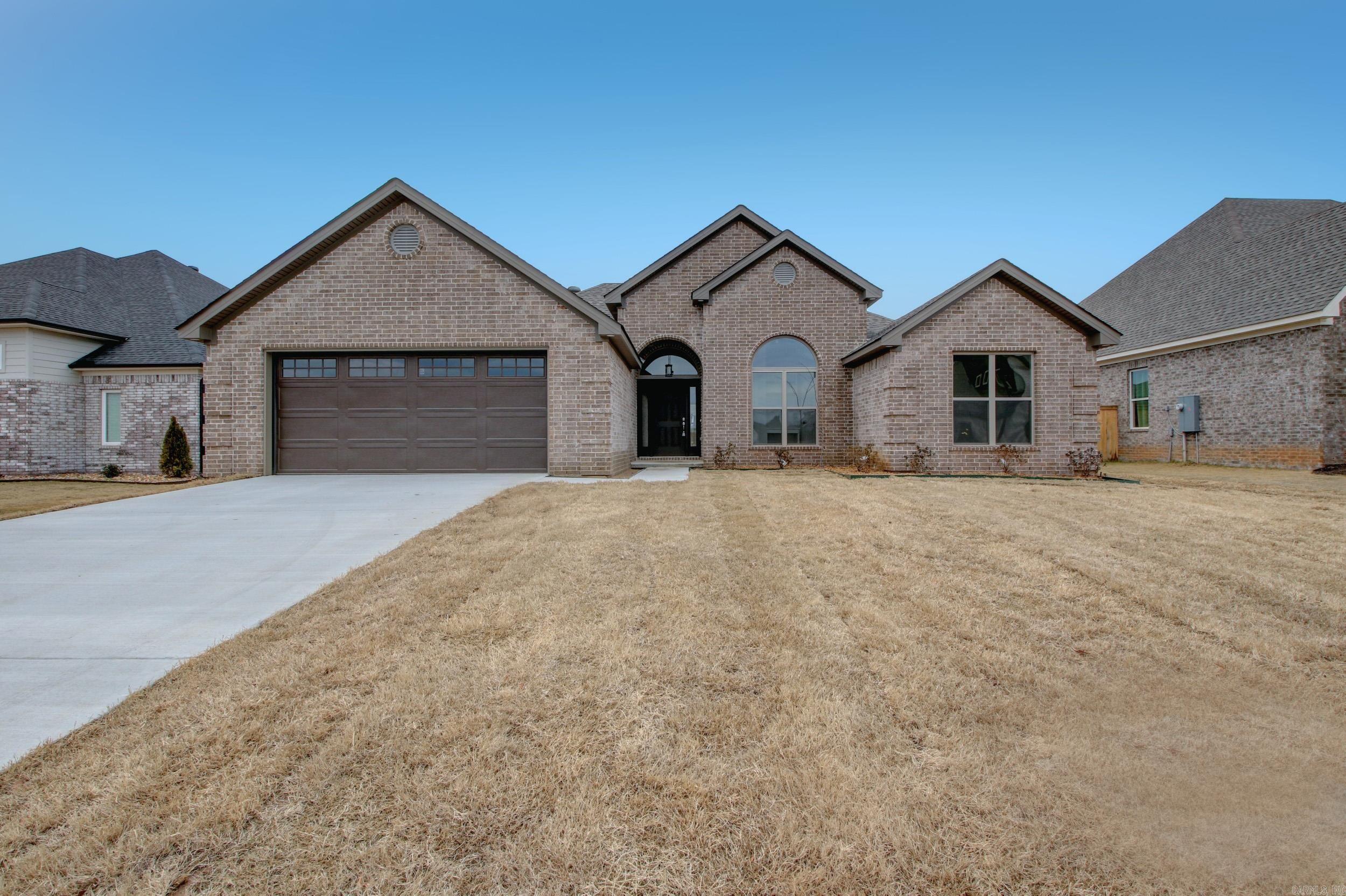 Beautiful luxury living new construction home! Quality & comfort unite in this stunning residence, showcasing an inviting open floor plan that seamlessly integrates the living, dining, & kitchen areas – an ideal setting for modern living & entertaining. This one level home features a guest bedroom w/ ensuite bath, 2 guest bedrooms w/ full bath, & primary bedroom with a full bath, offering unparalleled convenience & accessibility. The kitchen is a chef's dream w/ quartz countertops, breakfast bar, & pantry, equipped w/ sleek stainless steel appliances that elevate your culinary experience. This home promises a lifestyle of comfort, convenience, and luxury. Enjoy an abundance of natural light streaming through large picture windows, creating a bright & airy atmosphere. Primary bedroom is spacious w/ spa-like bath to include custom tiled shower, double vanities, soaking tub, & large walk-in closet. Step outside to the covered patio, amazing for entertaining guests or unwinding in the privacy of your backyard. Schedule your viewing today & embark on a journey towards a life of unparalleled comfort and style.