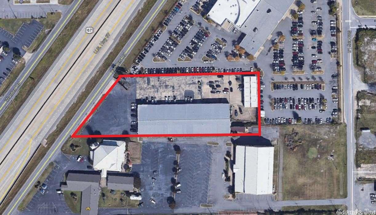 30,801+/- sq ft industrial/commercial/retail building on 2.31 +/- acres. Zoned Highway Commercial and an 81,000 VPD traffic count! Tenant is auto dealership.