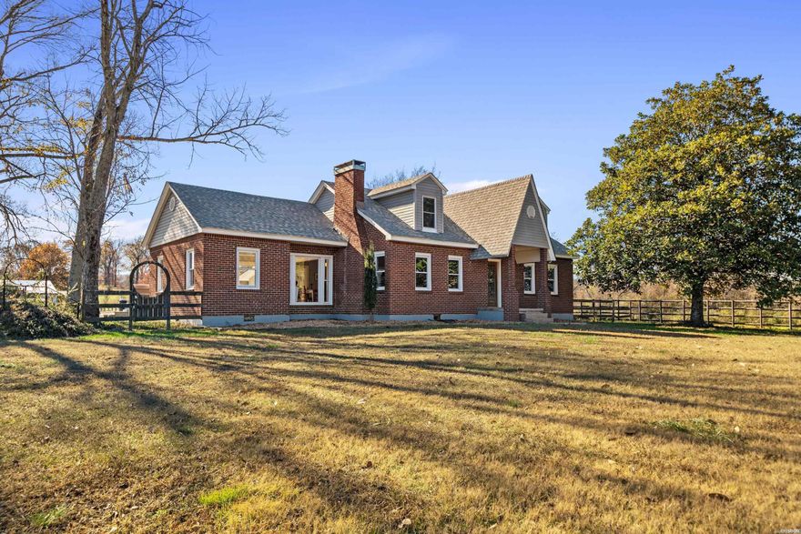 Attention horse enthusiasts! This 4 bedroom, 3 bath home is situated on 20 scenic acres in Lakeside School District, located just 8 miles from Oaklawn Park.   In addition to the beautiful home, the property features a 2,500 sq. ft. horse barn equipped with 8 stalls, including a washing station and birthing stall.  Adjacent to the barn is a spacious 250' x 125' riding arena, ideal for training or recreation, as well as a separate equipment shed. The property has city water along with multiple water wells throughout.  The views of the surrounding mountains are stunning! This rare find combines country living with exceptional equestrian amenities in a highly sought-after location.