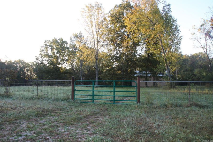 Bring your dreams to this 4.58-acre level, fenced property just 2.5 miles from Bull Shoals Lake and less than 5 miles to White River! With no restrictions the possibilities are endless-build your home, set up an RV or tiny house, or start your hobby farm. The land features a 40x44 barn, and utilities already in place-including septic, power, and water, saving time and money.  Plenty of space for livestock, gardens, or lake/river toys, all in a quiet country setting just minutes from fishing, boating, and outdoor recreation.  Don’t miss this rare find, acreage with infrastructure this close to both the lake and river doesn’t come around often!