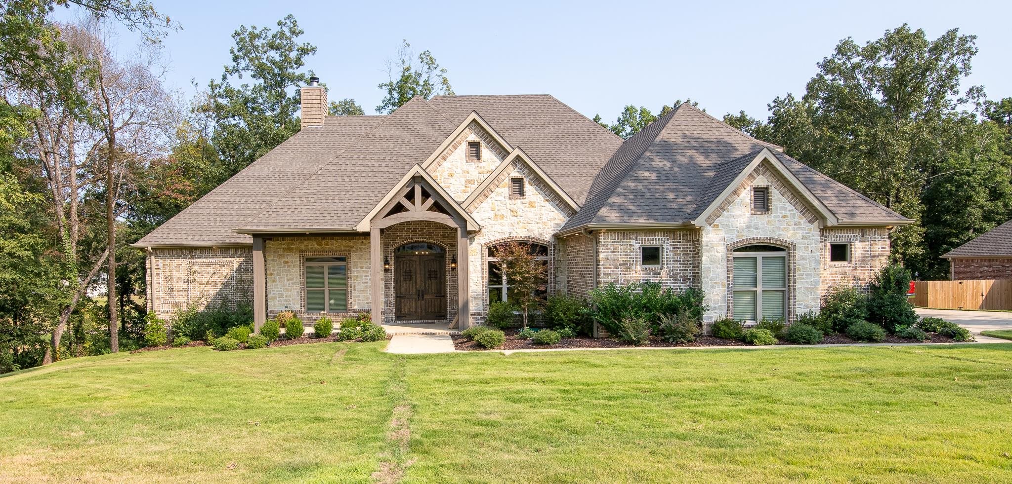 Beautiful custom built home located on 1 acre in Sierra Ridge.  Features 4 bedrooms, 4 full baths, 4 car garage.   Master and two bedrooms on main level.  4th bedroom, bonus room, and 4th bathroom on upper level.  Home includes safe room, office, bonus room, camera system, lawn sprinkler system, and much more!  Foam insulation throughout attic provides affordable utilities.