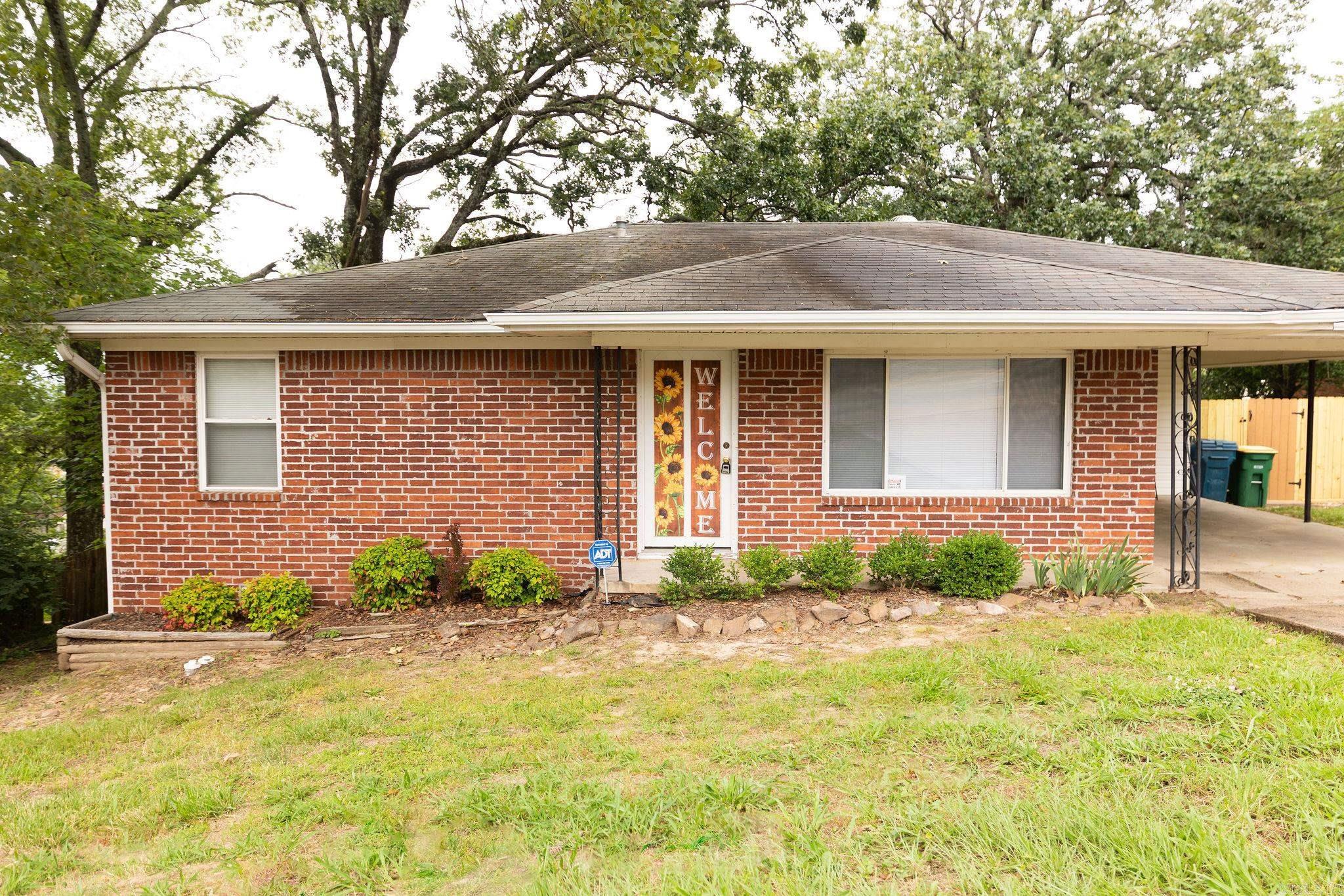 Newly updated and move in ready. Newly updated kitchen with new cabinets, granite, flooring, lighting and sink. Updated bath. Insulated windows. New blinds throughout. New paint. New fencing. Don't miss the extra-large backyard with mature shade trees. Covered parking. Three bedrooms on one level. Convenient location. Easy access to downtown and freeway. Close to mid-town shopping and restaurants.