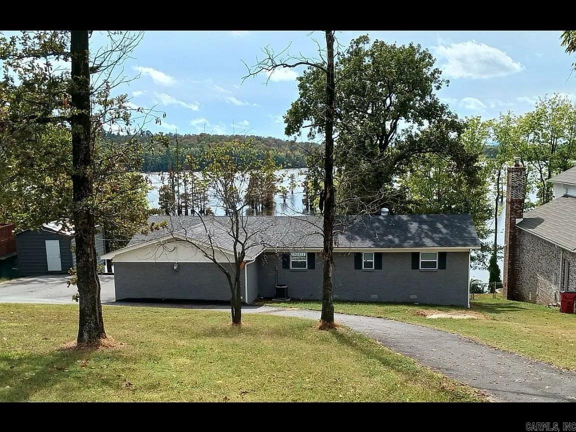 Charming lake view home on an 1/2 acre lot in Mayflower. Offers peaceful lake views and the best of comfort and convenience.