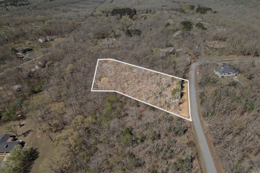 This is a gem of an opportunity! This lot is nestled in a well established and desirable neighborhood that sits among mature trees, while still offering convenient access to town. It is located less than 2 miles from Walmart and just minutes from local favorites like Chef Candace and Fire & Stone. Build your dream home here and enjoy the peaceful setting without sacrificing convenience. *See associated docs.  But why buy one lot when you can have two?? Its neighbor is for sale too! (MLS#493006) Two large, side-by-side lots are available in Cabot’s beautiful Deer Creek subdivision. Opportunities like this don’t come along often!