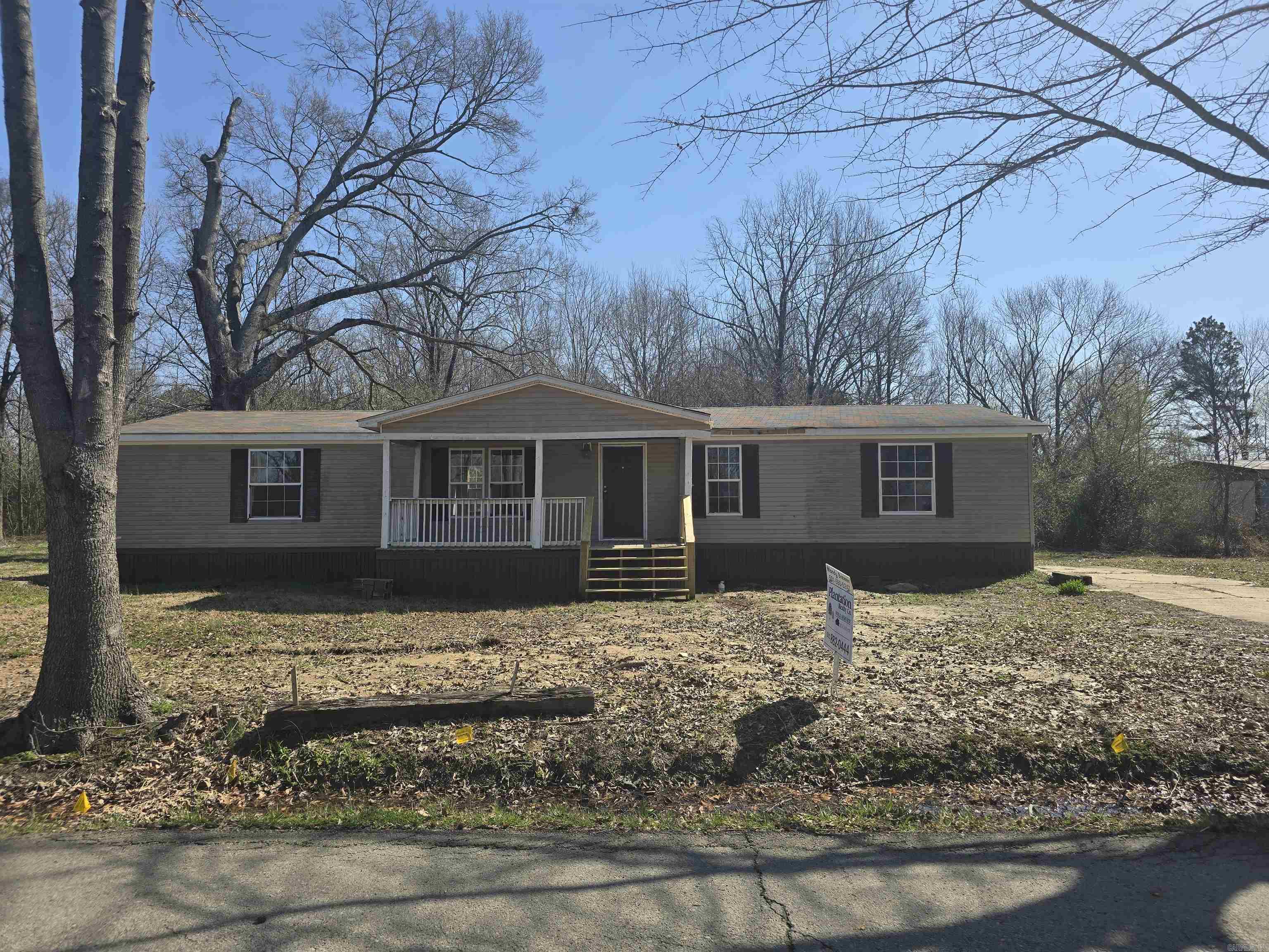 Motivated Seller!! Charming 3bed/2 bath mobile home on 2 city lots! Perfect blend of comfort and space in this home on two lots. Whether you are looking for extra yard space or room to expand, this property offers plenty of possibilities. Open floor plan with wood burning fireplace. Split bedroom plan with walk in closets and separate laundry room. This home is on a permanent foundation. Convenient location that gives you a country feel but not far from freeway access. Schedule your showing today!