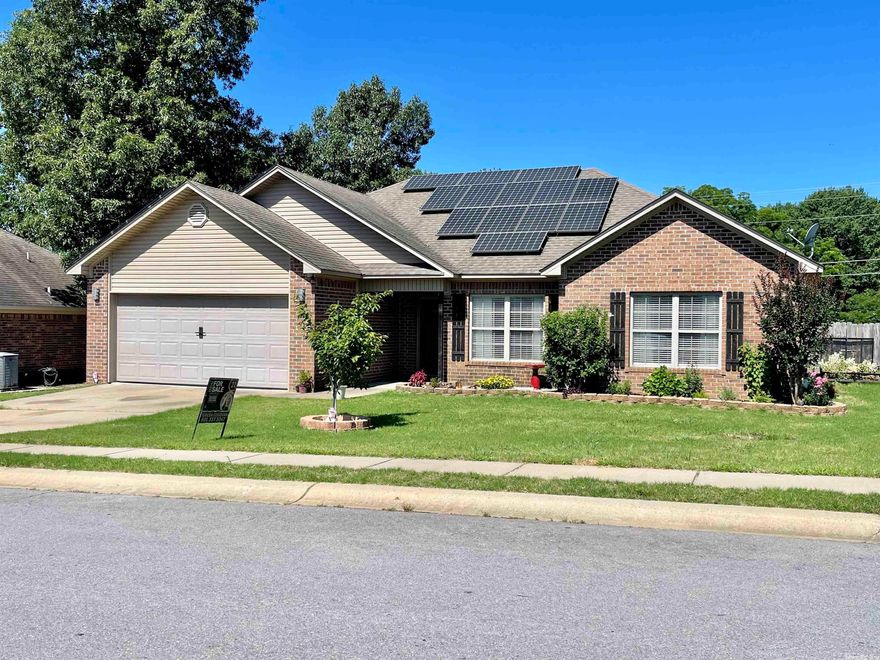 Check out this amazingly adorable home in Bryant school district!!!  Loaded with lots of updates this beautiful home can be yours!!!  This 3-bedroom 2-bath home has high ceilings in the living room, new paint throughout, new LVP flooring, new interior and exterior lighting, newly painted kitchen and bathroom cabinets, new paint kids bedrooms, under cabinet lighting, some outlets have been swapped to upgraded lighted face plates as well as some outlets have been upgraded to outlet plus USB port, LED lighting throughout and so much more! Ring doorbell and smart thermostat and surveillance equipment to stay. Large back yard with huge deck. Solar panels installed in 2020....(VERY MINIMAL ELECTRIC BILL IF ANY) Solar Panels still have 22 years of warranty that WILL TRANSFER TO THE NEW OWNERS!!!!  Tons of new landscaping including new trees and flower beds redone. This is such a cute home, and it is ready for you and your family!!!  CHECK IT OUT ASAP!!!  Don't hesitate, make it your new home today! SOLAR PANELS TO BE PAID OFF BY SELLERS AT CLOSING!!!    YOU DON’T WANT TO MISS THIS AMAZING HOME!!!