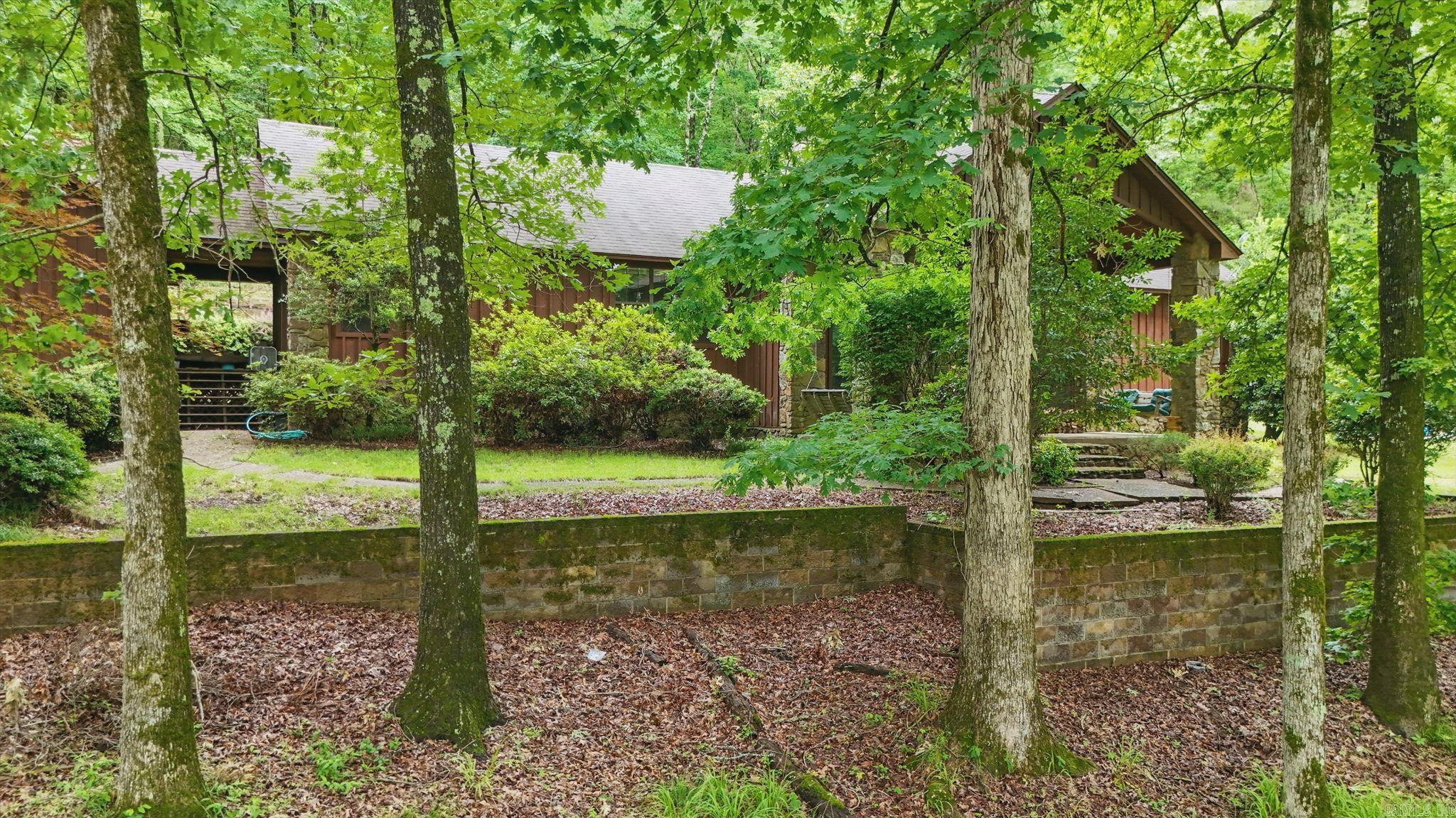 Nestled on nearly 5 scenic acres in West Pulaski County, this family-friendly property offers endless potential and plenty of space to spread out. Enjoy peaceful country living with a large deck for entertaining and a spacious covered patio perfect for relaxing outdoors. The main home is full of charm and ready for your personal updates—an ideal opportunity to make it your own while building equity. A recently renovated guest house adds incredible value—great for extended family, a home office, or income-producing potential. With room to roam, space to grow, and flexible living options, this property is a rare find in a beautiful, private setting. Don’t miss your chance to turn this into your dream homestead!