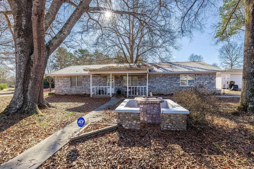 Nestled on over 2.5 acres in the charming town of Antoine, AR, this delightful 2-bedroom, 2-bath home offers a serene retreat with plenty of space to enjoy. The property boasts a spacious lot with multiple outbuildings, including a versatile 600 sq. ft. shop, perfect for projects or storage. Relax and unwind on the screened-in porch or gather in the inviting den. The open-concept living and kitchen area is perfect for everyday living and entertaining. A durable metal roof ensures long-lasting protection. With its blend of comfort, functionality, and outdoor potential, this property is an excellent opportunity for anyone seeking space and versatility in a peaceful setting.