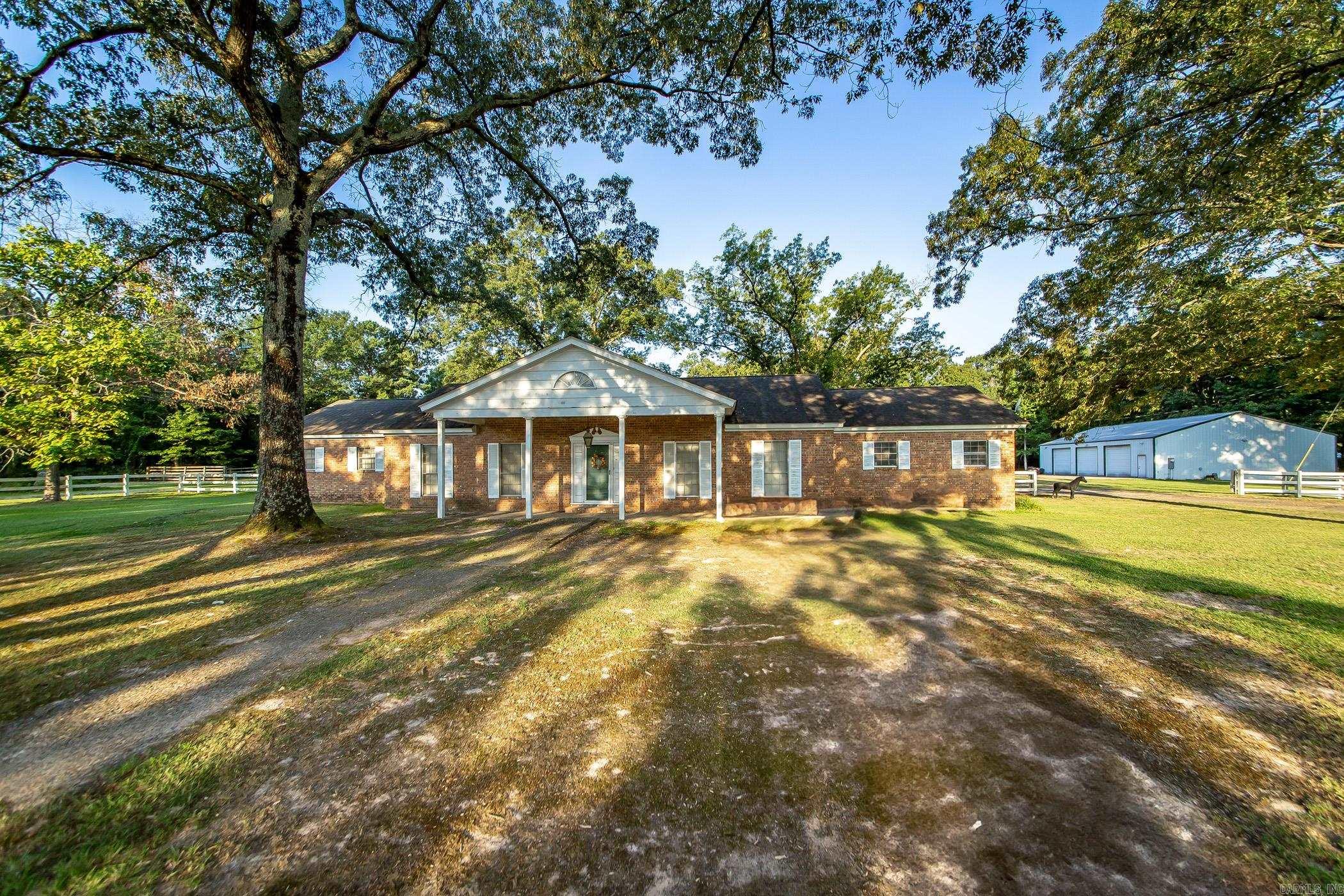 Spacious Home on 8+ Acres! Perfectly located just off Alcoa Road, this property offers the best of both worlds—peaceful country living with quick access to shopping, dining, and I-30. Featuring over 8 acres of land, a huge shop, horse stalls/shed, and a garage, it’s ideal for those needing space for hobbies, animals, or storage. With plenty of room to build additional structures or expand existing ones, the possibilities are endless. This is a rare find in the Bryant area!
