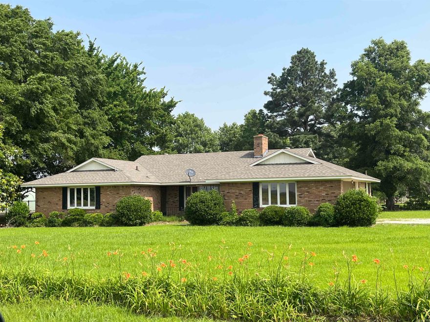Located on 3 acres South of Harrisburg in the peaceful community of White Hall, a traditional Brick Home offering both comfort and functionality. This home has a very thoughtful, well laid out interior spanning 3 bedrooms, 2.5 bathrooms, a laundry room and gas log fireplace in the living area. The kitchen is very practical and spacious. This property offers the asset of a pole barn style shop, secured on a concrete slab with ample space for hobbies, storage, etc.., 2 wooded acres, plenty of room for outdoor activities and enjoying rural activities