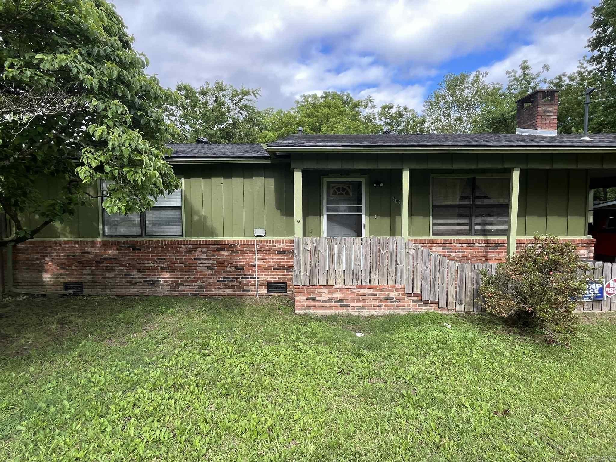 Charming and unique 2 bed/2 bath on a quiet street in town. Updates include NEW flooring, interior wood and metal siding, new bathroom fixtures and vanities, and a fully renovated āBunkhouseā in the back with an ADDITIONAL, BEDROOM, BATHROOM and RV hookup! The home is spacious with two fully updated bathrooms (including one accessible shower), multiple closets, a laundry room, sun room, and carport. It has a large backyard with some lovely shade trees. This home is ideally located to access the future Mountain Bike Trail System! It would make a fantastic primary residence or investment property!