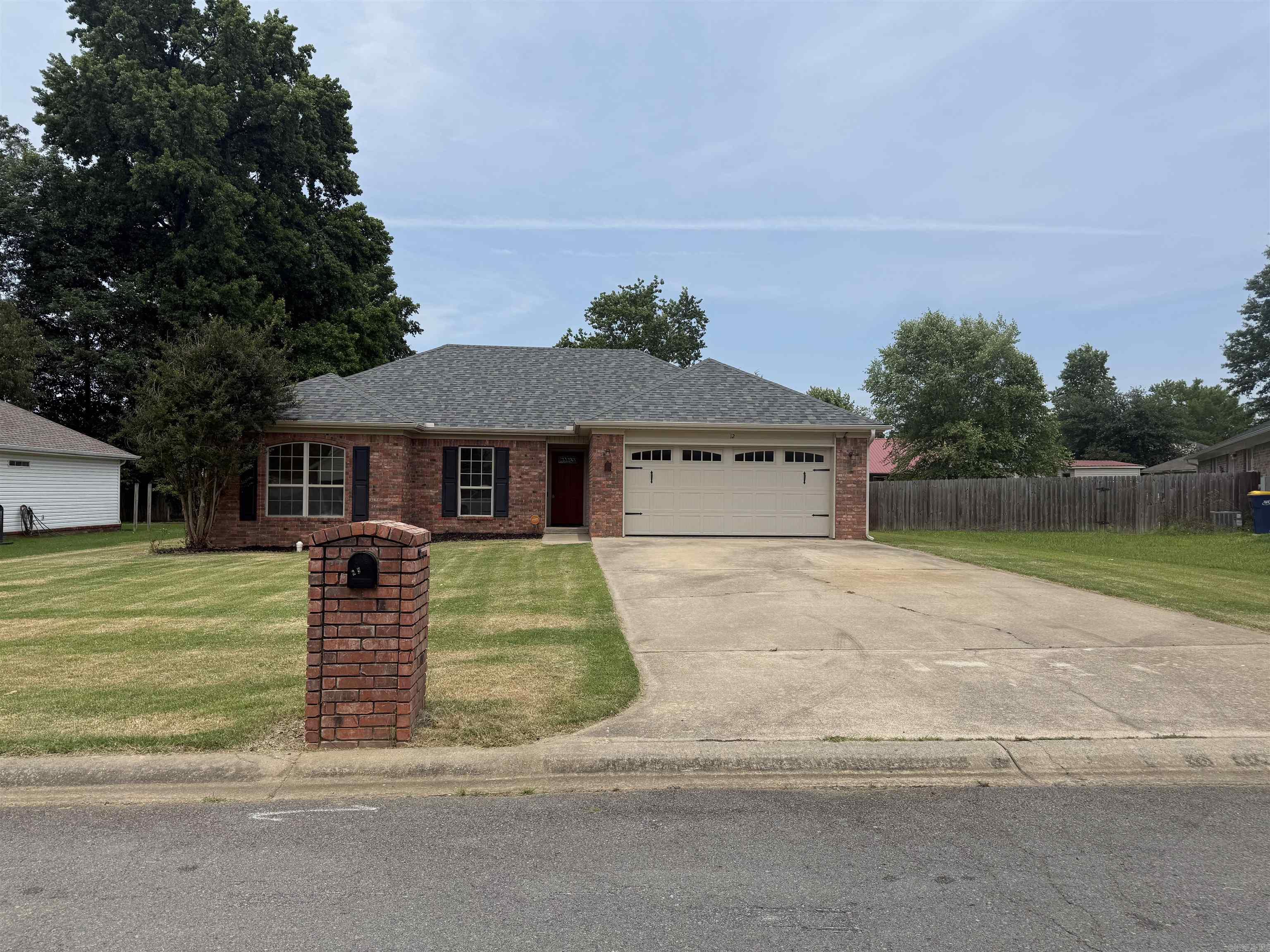 This adorable home is move in ready and waiting for you to make it yours! Features include a split floor plan, a great room with fireplace and boxed ceiling, large master bedroom with 2 closets and spacious master bath! New luxury vinyl plank throughout and fresh paint in 2025! Roof , siding and gutters were replaced in 2021. Large fenced yard with storage building is perfect for barbecues and family gatherings. Schedule your showing today!