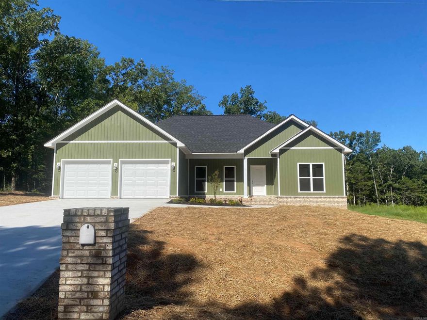 Beautiful new construction that sits on an acre with woods! Nice setting. This home boast of three bedrooms and two full baths. You have large open rooms with 9 foot ceilings. Nice large deck off the back of home to enjoy your view of the woods and relax. This home is in the Greenbrier school district. Come check it out one not to miss for a new home on an acre.