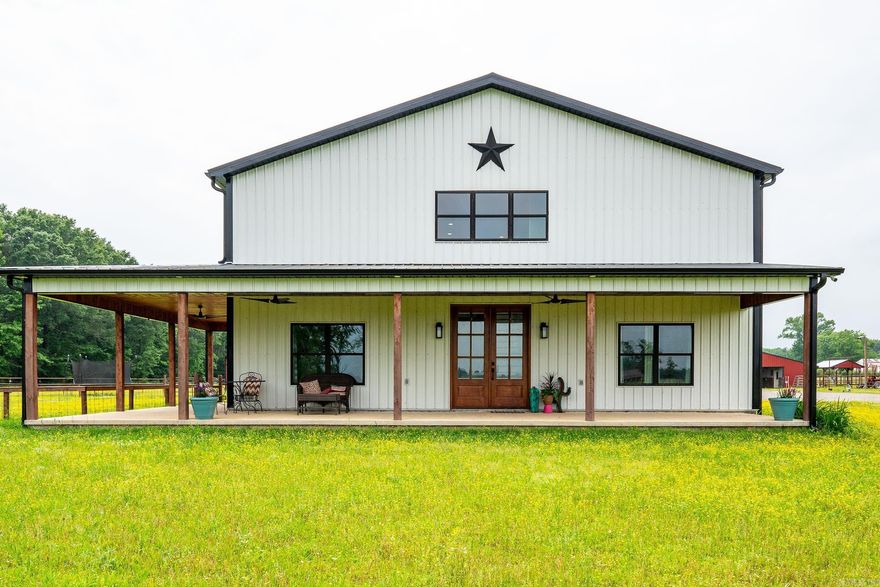 Experience the perfect blend of country living and functionality at this exceptional Vilonia property—designed with space, comfort, and equestrian living in mind.  This 5 bed, 3.5 bath home offers a spacious and inviting layout ideal for both everyday living and entertaining. Inside, you’ll find generous living areas, abundant natural light, and a well-designed floor plan that makes this home as practical as it is welcoming. An added bathroom conveniently located in the carport area provides extra functionality for outdoor living.  For horse enthusiasts, this property is truly a dream setup. The 5-stall horse barn is fully equipped with a feed and tack room, making daily operations efficient and organized. Enjoy year-round riding with the attached covered riding area, along with a separate outdoor arena for training and recreation.  In addition, a separate barn offers versatile space for hay storage, trailer parking, or additional equipment, adding even more value and usability to the property.  Set in a peaceful rural setting while still being conveniently located near Vilonia schools and just a short drive to Conway, this property offers the best of both worlds.