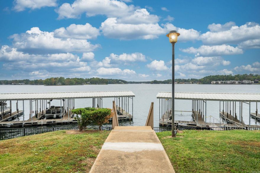 INVESTORS TAKE NOTICE - BEAUTIFULLY UPDATED CONDO RIGHT ON THE WATER! Welcome to your weekend retreat on Lake Hamilton. This well-appointed 2 bedroom 2 bath condo can be used as a short-term vacation rental. BOAT SLIP INCLUDED. Watch the fireworks from the patio in this 1,116 sq ft fully furnished condo including refrigerator, washer and dryer. Convenient 7 South location close to everything - located less than 5 miles to Oaklawn Racing Casino Resort and about 6 miles to downtown Hot Springs and Bath House Row. . Complex features gated entrance, swimming pool and pickle ball courts. This unit sits right on the water with amazing main channel views. This one is a must see!