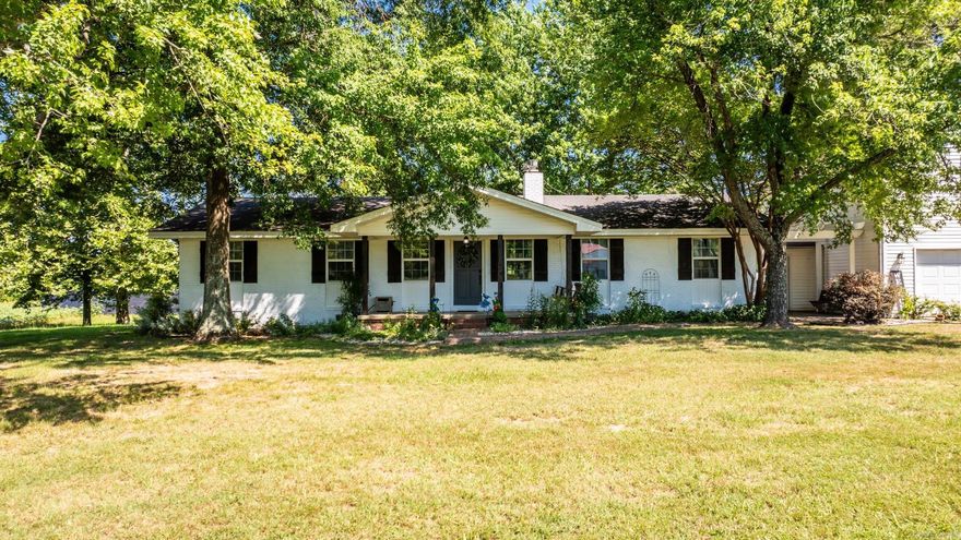 Welcome to your dream home, nestled outside of Greenbrier, 30 min from Conway, only 1 hour from Little Rock, AR. This beautifully remodeled house boasts two primary bedrooms, ensuring ample space and privacy for family and guests. Every inch of this home has been meticulously updated. There is a spacious 24 x 30 shop, complete with a cozy wood-burning stove, perfect for projects & hobbies & a charming 10 x 19 shed, offering a retreat for relaxation or creative endeavors. Set on over 7 acres of picturesque land, you will find a mix of majestic old-growth hardwoods and vibrant fruit trees. The location is ideal for outdoor enthusiasts, with the world-class trout waters of the Little Red River just 40 minutes away & Greers Ferry Lake only 39 minutes from your doorstep. This home is equipped with off-grid capabilities, including solar power & a well, yet also offers the convenience of city water and electricity. Whether you seek tranquility in nature or the comfort of modern amenities, this property delivers it all. Experience the perfect blend of rustic charm and contemporary luxury in this exceptional home. There are 1.87 acres adjacent to this listing that can be purchased as well.