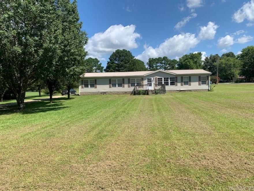 This spacious manufactured home sits on 1.08 acres and boasts 4 bedrooms and 3 baths. Situated just minutes from Downtown Jonesboro and ASU. With two carports and a paved drive, this charming property offers endless possibilities for outdoor enjoyment. Handicap accessible, HVAC 1 year old, permanent foundation. Don't miss the opportunity to own this peaceful retreat