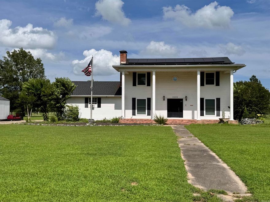Charming Home on Fairway Drive – Golf Course Living at Its Finest! Nestled along the picturesque Stuttgart Country Club golf course, this beautifully maintained home on the desirable Fairway Drive offers the perfect blend of elegance, comfort, location, and solar power! Surrounded by beautiful views on approximately one acre, this 4 bedroom, 2.5-bath home is ideal for those who appreciate space and serenity. Inside, you’ll find wood floors throughout the main area of the first level, with a flowing layout that connects the kitchen, breakfast area, and living room—perfect for everyday living and entertaining. The spacious laundry room adds extra functionality, while thoughtful features like extra closets and a half bath bring character and charm. Upstairs, all four bedrooms offer privacy and comfort, including a generous primary bedroom with an en suite bath. The hall bathroom serves the upstairs bedrooms, providing convenience for families or guests. Step outside and take in the peaceful views of the golf course, mature trees, and established landscaping—truly a rare find in a prime location.  This is a must-see home in a sought-after area. Call today to schedule your private tour!