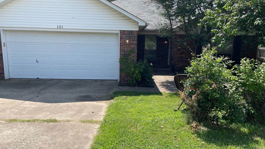 Fabulous 4 bedroom.  Great layout with lots of windows.  Fun yard complete with a pergola.  Kitchen is beautiful and unique.  Huge laundry room with sink.  Qualifies for no downpayment loan.