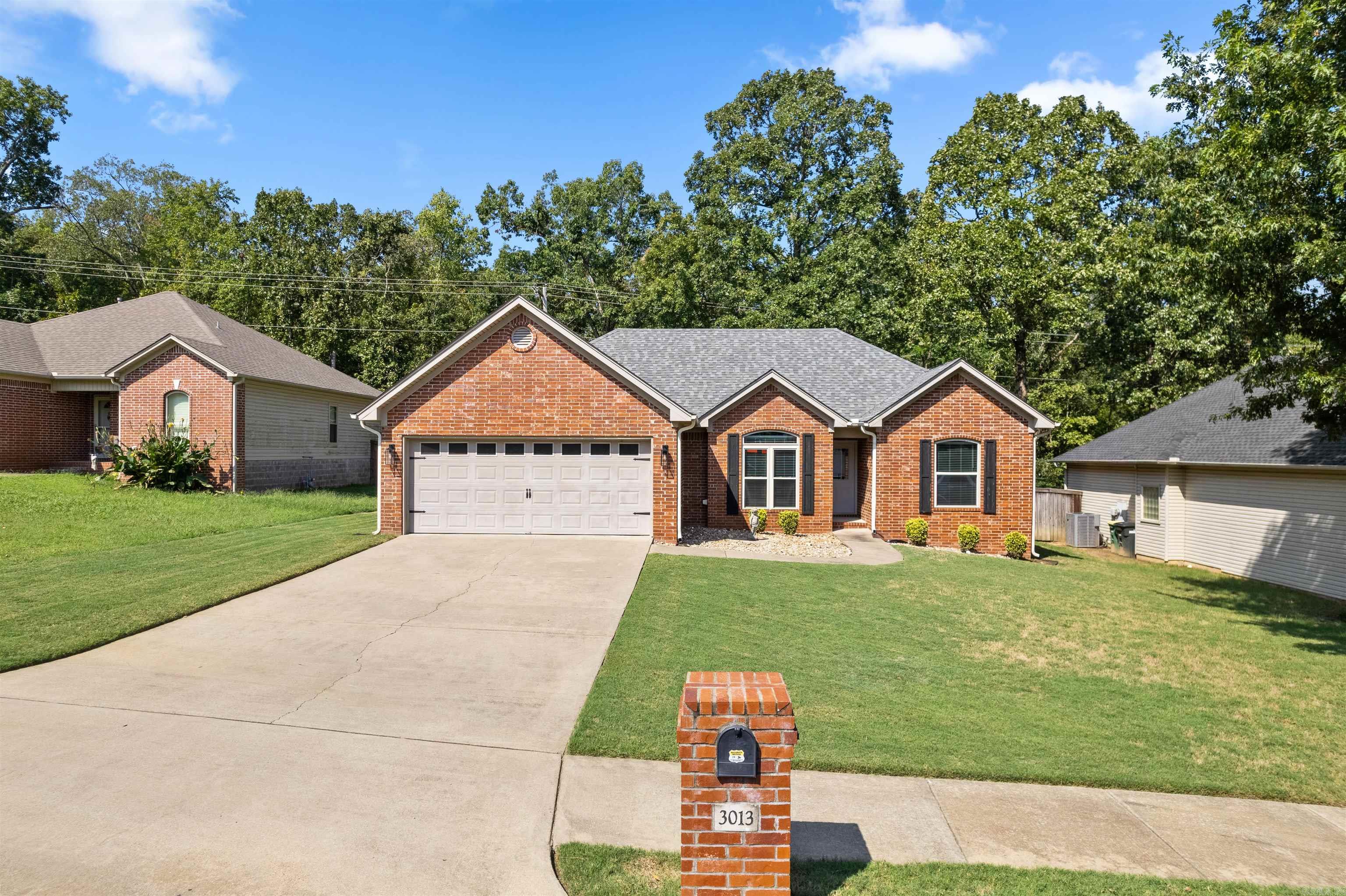 Welcome to this immaculate 3 bed 2 bath home. Well maintained and updated! When you walk in from the front door you are greeted into the living area, with the formal dining area to the left. The kitchen is to the left of the living room as well, super spacious. Kitchen has a breakfast nook, and a breakfast bar. Updated kitchen counters, new appliances, and touch sink faucet. Split floor plan guest rooms and guest bath on the right side of the home with the primary bedroom and bath on the left side. Guest bath is fully remodeled as well as the primary bathroom, which has a full walk in shower and new countertops. When you walk out into the fenced in backyard, there is a covered patio w/ pergola with an outdoor fireplace and a separate fire pit. Backyard backs up to Sherwood Forest and has a gate to allow you access to Sherwood Forest. This is a gorgeous home thats ready for its new owner! Fridge, pergola, outdoor firepit, and outdoor fireplace stay.