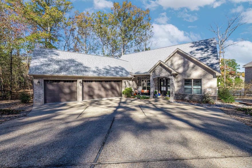 Want new but don't want to build it? Now is your opportunity to walk in to the stunning home on Lake Estrella that has barely been lived in. This all brick home welcomes you from the moment you walk in. Entertaining is a breeze in this chef's kitchen with an open floor plan. Amazing windows across the rear of the home makes this home light and bright while enjoying the lake view. Spacious primary bedroom and bath with oversized walk in shower and two walk in closets. Divided bedrooms gives you and your guests the privacy desired.  Step outside and relax on either covered patio. Entertain on the stone cooking patio or take the short walk to the lakeside stone patio that leads to the swim dock. Stone seawall on lake front. Fenced back yard! Finished bonus room above the garage. Storage galore in this home. Oversized three car garage! Leaf guards on gutters. Irrigation system is lake fed. See documents for John Stone Appraisal Services measurement for square footage. AGENT REMARKS