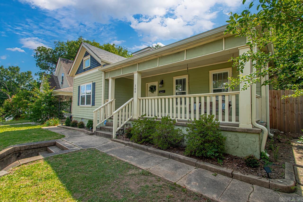 Experience the perfect blend of classic charm and modern updates in this super well kept, historic, craftsman HOME! This beautifully updated abode seamlessly marries the past with the present. You'll find original hardwood floors, complementing contemporary comforts. The remodeled kitchen is a chef's delight, boasting sleek granite countertops, white cabinetry, and stainless steel appliances, with a breakfast nook for casual dining. Relax in the spa-like remodeled bathrooms, featuring a timeless ball-and-claw tub for luxurious soaks. Throughout the home, you'll find elegant touches like recessed lighting and plush new carpet in the bedrooms. Peace of mind comes with a new roof. Unwind on the expansive large front porch, perfect for enjoying the vibrant atmosphere. A double-gated driveway with automatic opener, provides both convenience and security. The desirable Capitol View neighborhood is renowned for its tree-lined streets, diverse architecture, and strong sense of community. Enjoy easy access to downtown, UAMS, UALR, Hillcrest, Heights, Midtown and major highways. The neighborhood boasts NUMEROUS popular local eateries and Shopping and community green spaces and parks.
