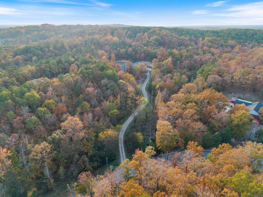 Set on 5.38 acres just outside the city limits, this custom home blends luxury, space, and privacy with extensive recent upgrades. Boasting over 5,500 sq. ft., it features 6 bedrooms, 5.5 baths, and a grand living room with soaring ceilings and a cozy fireplace. Numerous updates include fresh interior and exterior paint, new flooring, new trim, and modern upgrades throughout, giving the home a refreshed, move-in-ready feel. A highlight is the versatile in-law quarters with same-floor parking access, ideal for multigenerational living, a game room, Airbnb, or private guest suite. Two remodeled kitchens with stainless steel appliances make entertaining effortless, complemented by two laundry rooms, a formal dining room, a bonus room, and an office that can serve as a seventh bedroom. The newly remodeled master bath provides a spa-like retreat, while a newer roof (approx. 4 years old) and dual central HVAC systems ensure year-round comfort. With three fireplaces, a 3-car garage, and over 5 acres of usable land, there’s ample room for outdoor living, gardening, or future expansion—just minutes from city conveniences yet offering peaceful rural tranquility. Schedule your showing today!