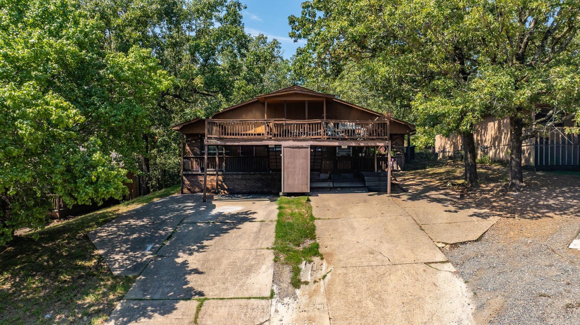 Attention investors!! Don't miss the great opportunity to own this duplex each unit featuring 3 bedrooms and 2 bathrooms in popular West Little Rock! It presents a compelling investment opportunity with its strategic location and potential for steady rental income. Positioned in a highly accessible area, it is just minutes away from major shopping centers, health care facilities, restaurants, and schools, with easy access to the interstate, making it appealing to a diverse range of tenants. The property consists of two separate units, allowing for flexibility in rental strategies. Investors can opt to rent both units for dual income or occupy one while leasing the other, ensuring a consistent cash flow. Each unit has its own utilities, minimizing the landlord's responsibilities. The landlord is only accountable for property taxes, insurance, termite policy, and repairs when needed, simplifying management. Each unit has its outside storage area and decking for entertaining, the left side units has new LVP flooring, new glass top electric range, disposal and toilets; the sewer line has been replaced as well. Schedule it today!