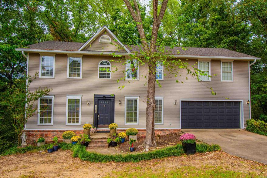 Beautiful home with almost 1 acre in the heart of Benton! Nestled on a tranquil cul-de-sac with breathtaking views! Immaculate 4-bedroom 2 1/2-bath home offers the perfect blend of comfort, style & natural beauty. Brand-new roof, gutters, & picture windows that showcase the stunning view! Gorgeous updated kitchen with granite counters, subway tile backsplash, a gas stove, pantry, eat-in kitchen area, breakfast bar & separate dining. Beautiful hardwoods throughout except carpet in bedrooms & tile in wet areas. Oversized Master Suite with double sinks & a large walk-in closet with built-in dressers. Discover a generous storage area in the crawlspace, conveniently accessible through a door. Say goodbye to excessive yard work. The property is designed for minimal yard maintenance, allowing you to focus on what matters most. Enjoy the convenience of neighborhood trails and a playground, perfect for outdoor activities and family fun. Benton Schools! Don't miss the chance to make this Benton gem your forever home. Schedule a showing today and experience the peace, comfort, and modern luxary this property has to offer!