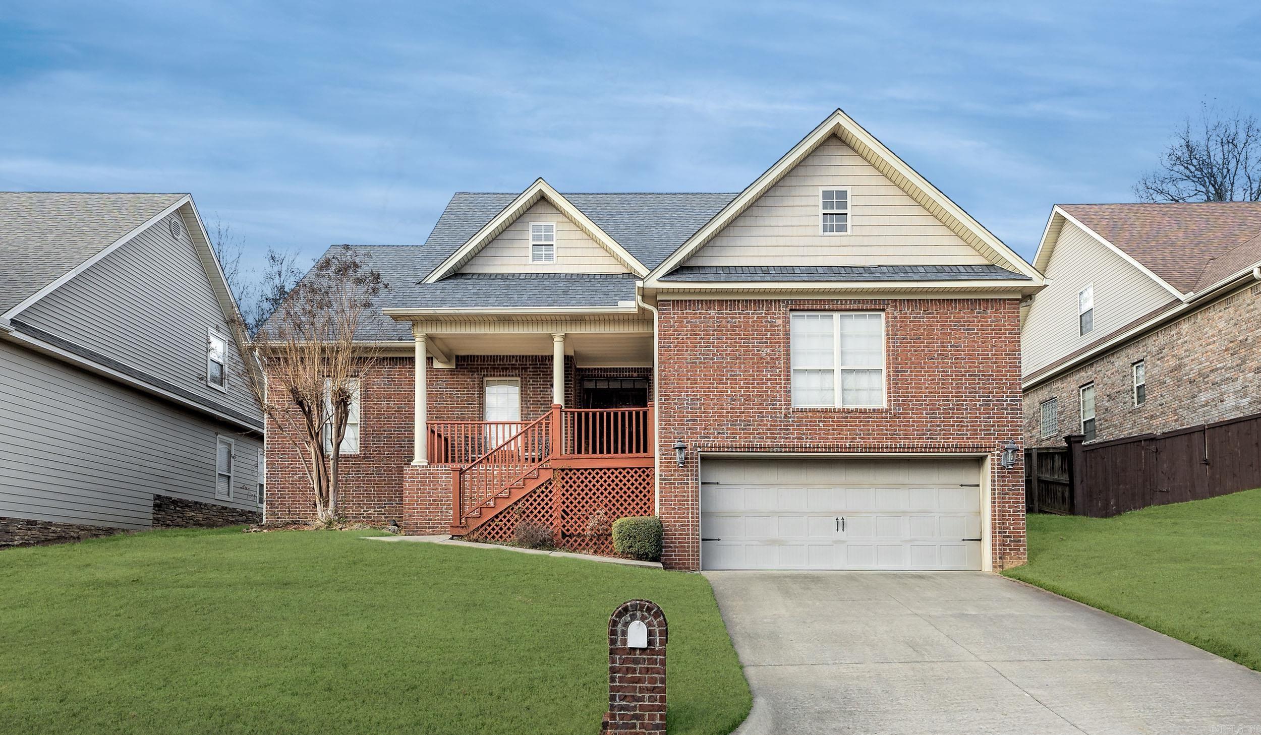 This breathtaking 4-bedroom home in a highly desirable West Little Rock neighborhood offers an exceptional layout with modern amenities and ample space for comfortable living. The main level features three spacious bedrooms, while an additional upstairs bedroom can serve as a game room or second master suite. A vaulted two-story great room with striking double front doors flows into the open kitchen and dining area, creating an inviting atmosphere. The kitchen boasts modern appliances and ample counter space. The luxurious master suite includes a double sink vanity, a separate spa tub, and a walk-in shower. An additional full bathroom is located upstairs for added convenience. A separate laundry room enhances functionality, while a covered front porch and covered back patio provide perfect spaces for relaxing or entertaining. Situated on a quiet cul-de-sac lot, this home is conveniently close to top-rated schools, shopping, and dining options. Don’t miss this incredible opportunity—schedule your private tour today!