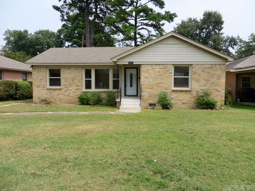 Adorable one level brick home!! Completely remodeled! Features include gorgeous hardwood floors throughout! Large open kitchen with new gas range and tons of storage. Laundry room located off kitchen includes built-ins. Master bedroom has attached half bath. Guest bedrooms are spacious! New windows, doors, cabinets, light fixtures, toilets, tile, etc... Too many updates to mention! Come see today!!!