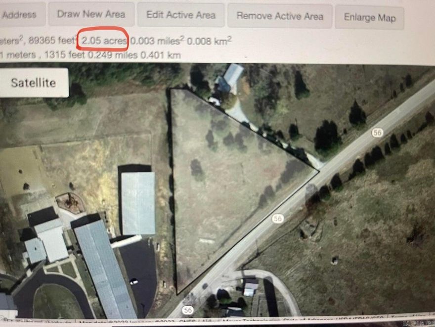 Good spot for a business in the heart of town. Beautiful 2 acres at Violet Hill. Nice fairly level lot/field.