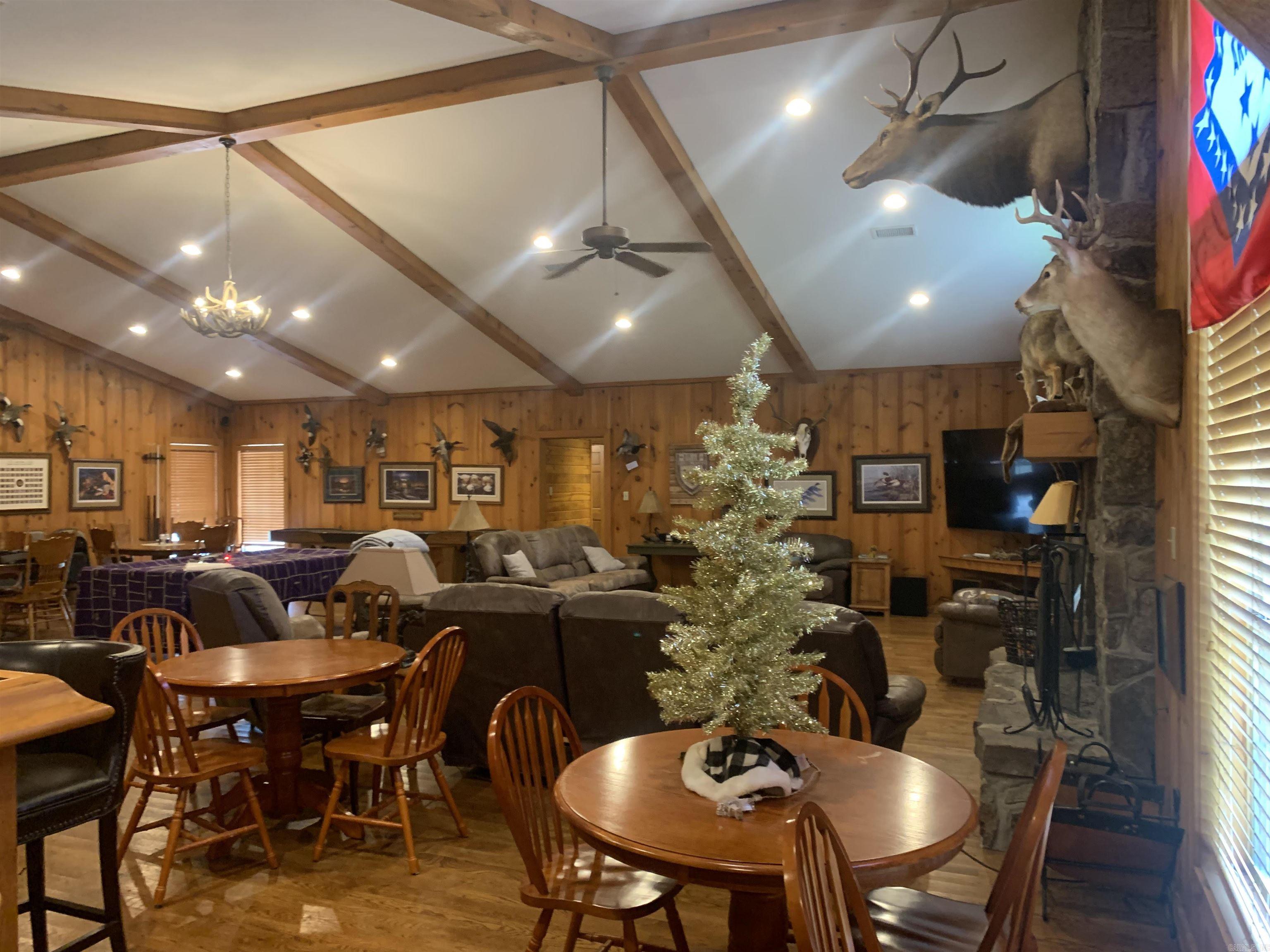 8 Bedroom. 5 Bath Hunting Lodge. 2-Boot Rooms with lockers/benches. 10 TV's. Fire Proof digital Gun Safe. Furniture, Appliances, Washer/Dryer. Pool table. Shuffle board table. 2 out buildings. 61 Acres Green Timber/CRP with Water Access levied. Established Duck Hole. Deer, Bobcats, Ducks, Geese, all wildlife.