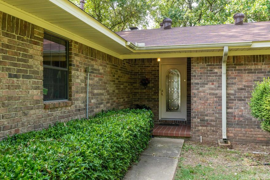 Lake life is calling!!!  Must see this three bedroom/three bath lakefront home on Lake Hamilton with a boat dock! Located close to restaurants and shopping!   Nice level lot with lots of trees! Bring you beach towels and sunscreen, this one won't last long!