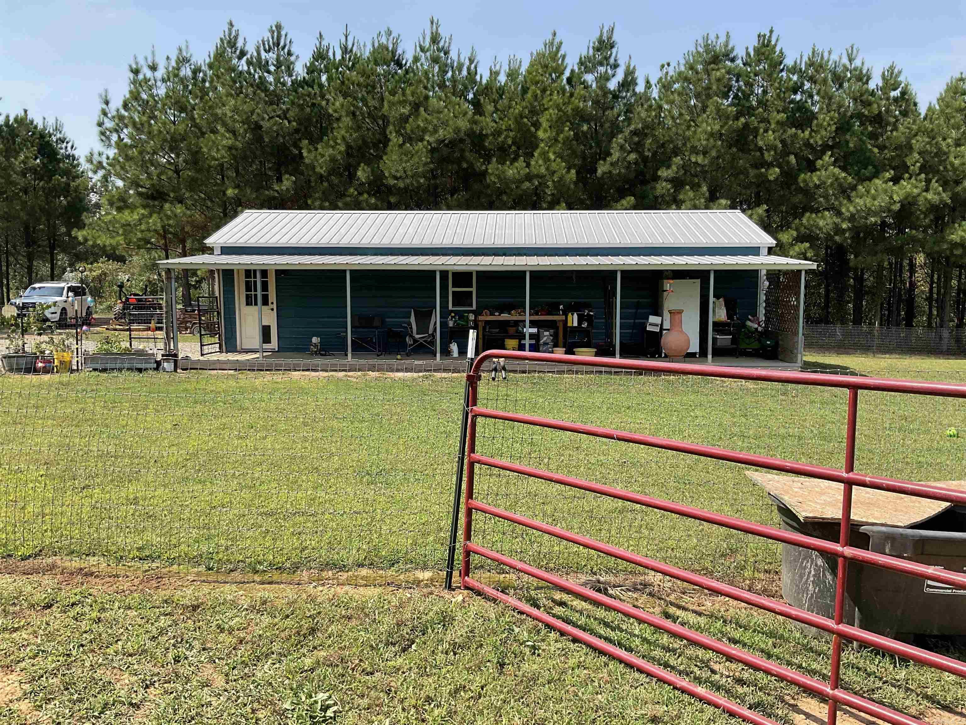 Wow !! A piece of Paradise so quiet and secluded , 5 beautiful acres a creek runs at the back part of the property , Fenced and cross fenced . Tractor and Zero Turn mower along with some implements for the tractor , storage area will also stay with property so much that will be staying it's hard to put it all in here ,Seller is moving away and doesn't want to take it Must see to appreciate . There are awesome views use as a getaway or a nightly rental will come partially furnished . Must give 24 hour notice