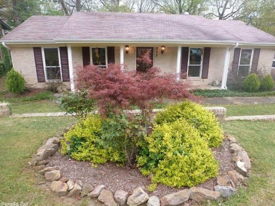 Conveniently located to all WLR amenities, this charmer has many updates: New roof in 2003; in 2009 new siding & insulated windows w/transferable warranty, exterior doors & guttering; crown molding. All flooring replaced with ceramic tile & wood laminate. Formal living room + large Den with fireplace open to dining & kitchen areas. Lots of storage with his/her closets in master bedrm, shelving in utility rm & floored attic. Gated back yard has storage bldg & rear 2-car private carport. Agents see remarks.