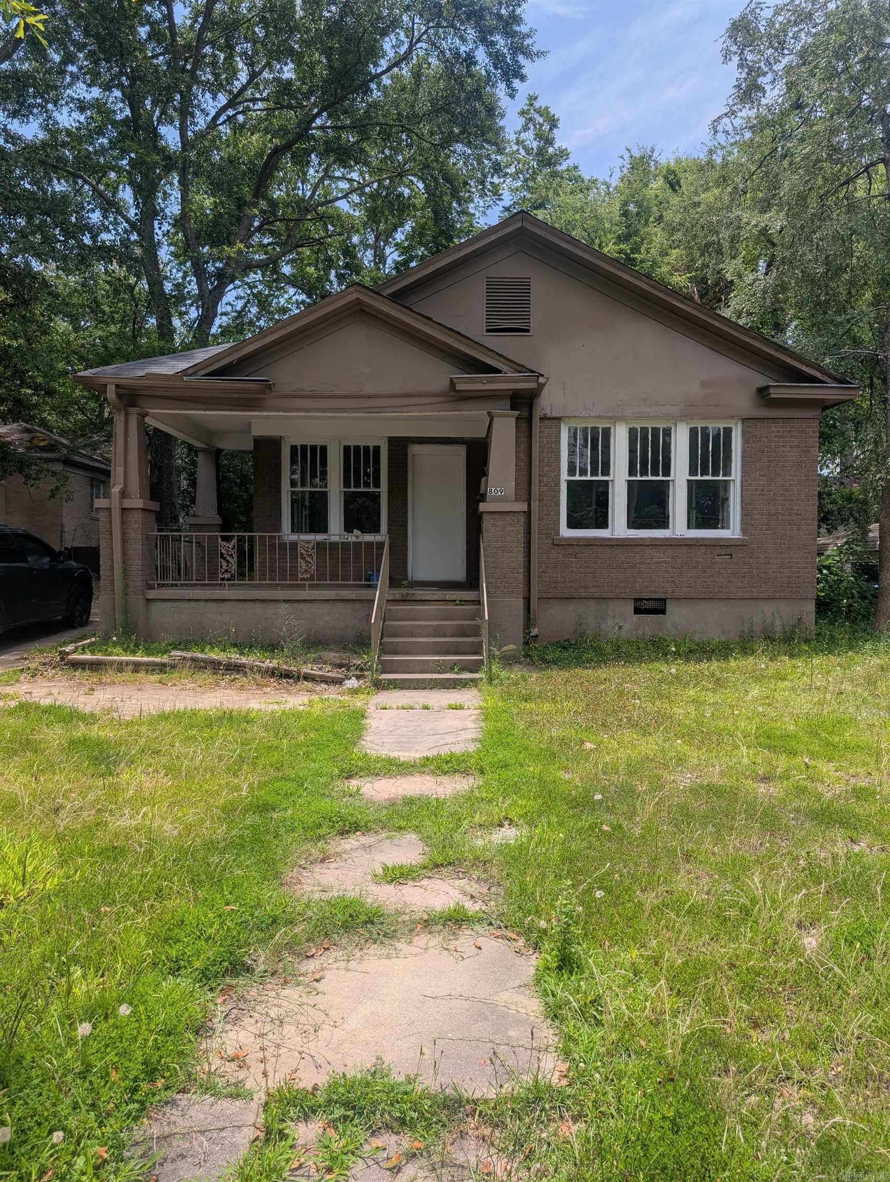 This quaint little cottage is ready for a first-time buyer. This 3-bedroom, 1-bath home has new flooring, kitchen sink & cabinets, and new bathroom fixtures. There is an office space off of one bedroom and a laundry room next to the kitchen. The spacious front porch is ready to be set up for relaxing evenings outside. There is a 1-car garage with a lean-to shed attached. The yard is fenced on sides and the back of the property.
