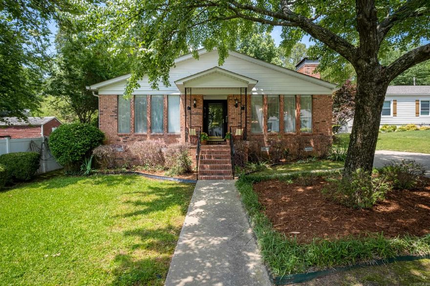 Freshly updated Sept '23, adorable spacious brick home with two living areas! Walk to shops, restaurants & parks. Inviting entry leads to an expansive living/dining room combo full of natural light, new fixtures and a brick fireplace & hearth. Off the breakfast room is a newly painted  laundry rm & bonus space. Split bedroom plan with a charming primary ensuite featuring 4 closets.  Enjoy a beautiful parklike view from the family room thru the French doors & many windows . Large fully fenced backyard. Upgraded kit: granite, Kohler sink, refrigerator, and flooring. Newer roof, whole house automatic generator, and sprinkler system. Kingwood/Cammack area! See agent remarks.